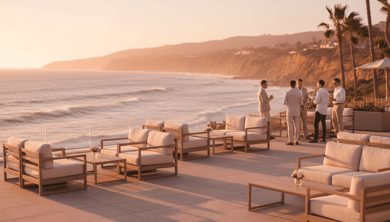 Oceanfront terrace with elegant seating overlooking Pacific Ocean at sunset